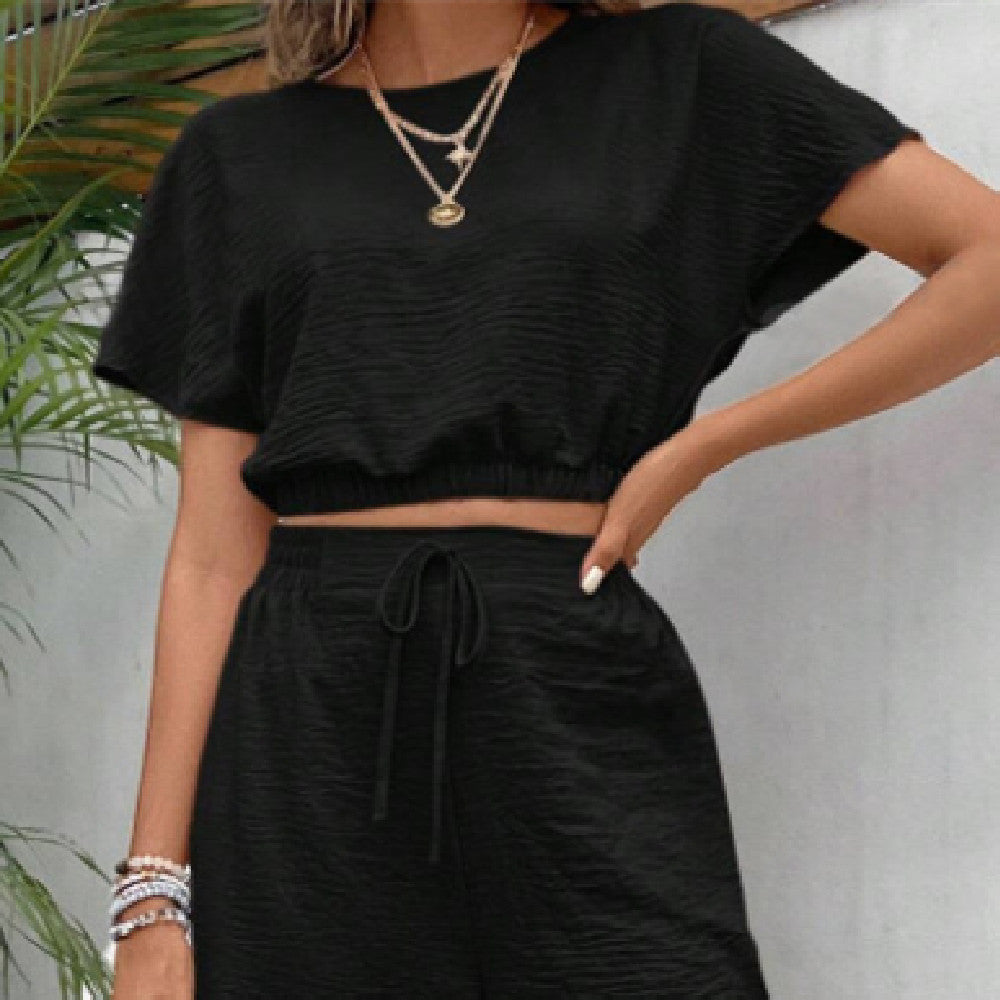 Ensemble Top Sans Manches & Pantalon Large – Sobriété Élégante